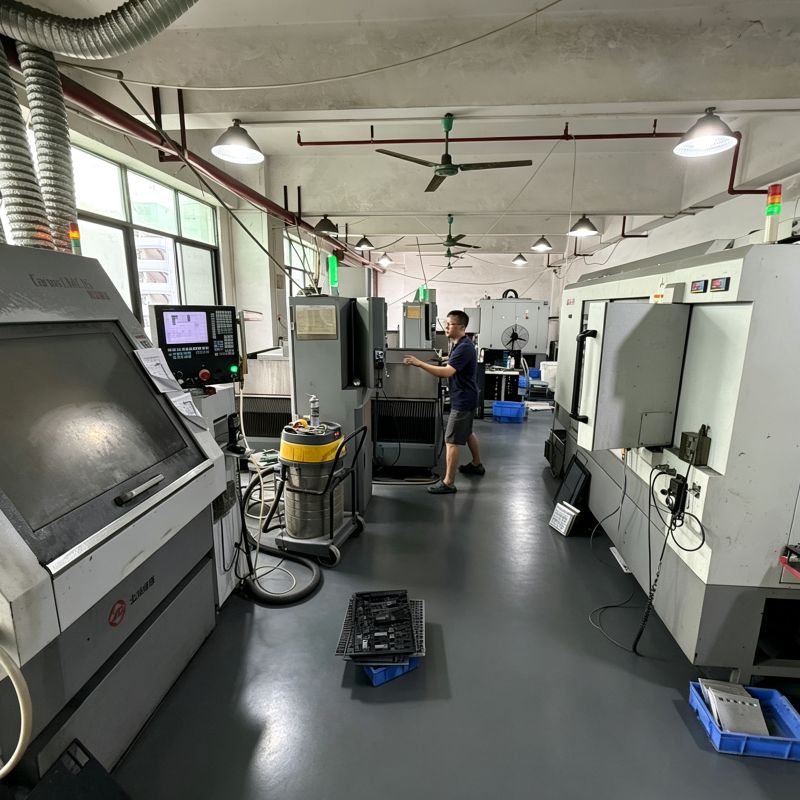 Full view of CNC machining workshop, multiple CNC machines for custom jig and fixture manufacturing production