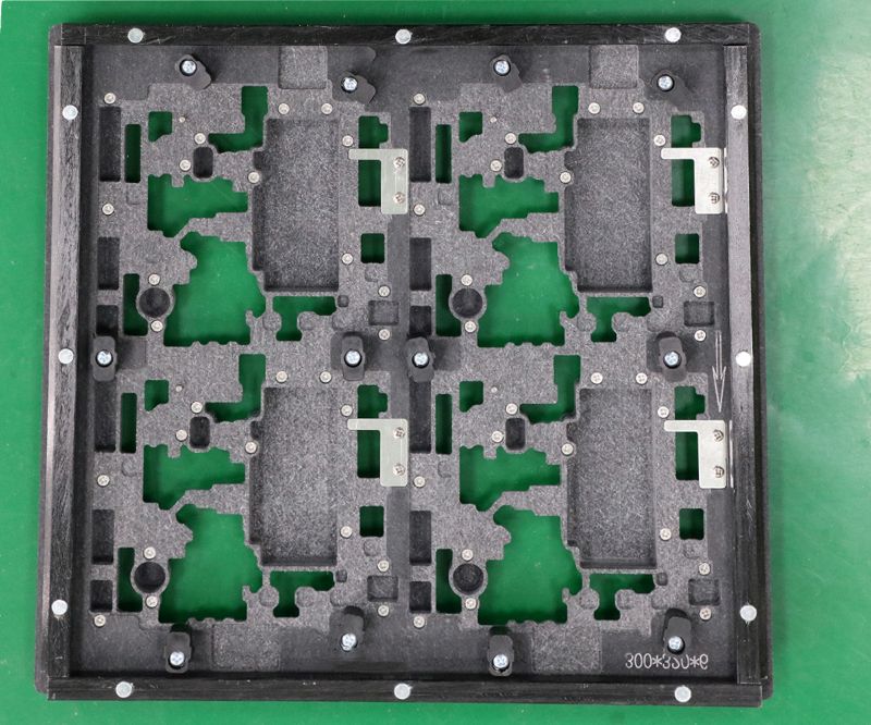 Detail view of 4-up multi-cavity wave soldering jig with positioning latches for PCB wave soldering production
