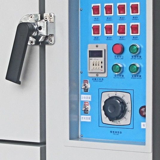 Close-up of control panel, buttons and timer on thermal aging test chamber
