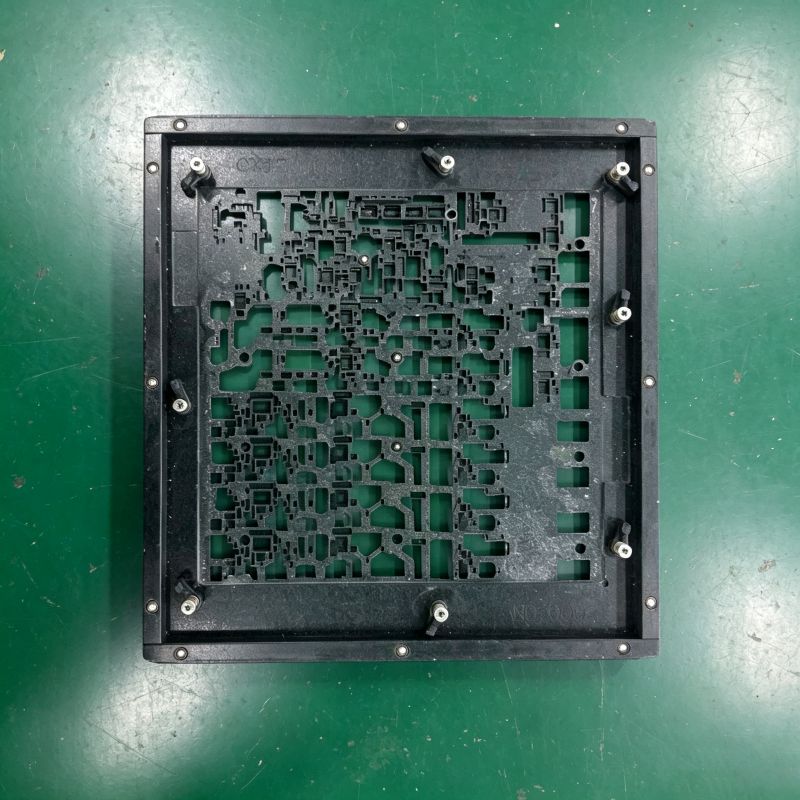 Top view of complex multi-cavity wave soldering fixture with multiple locating fasteners for intricate PCBA wave soldering