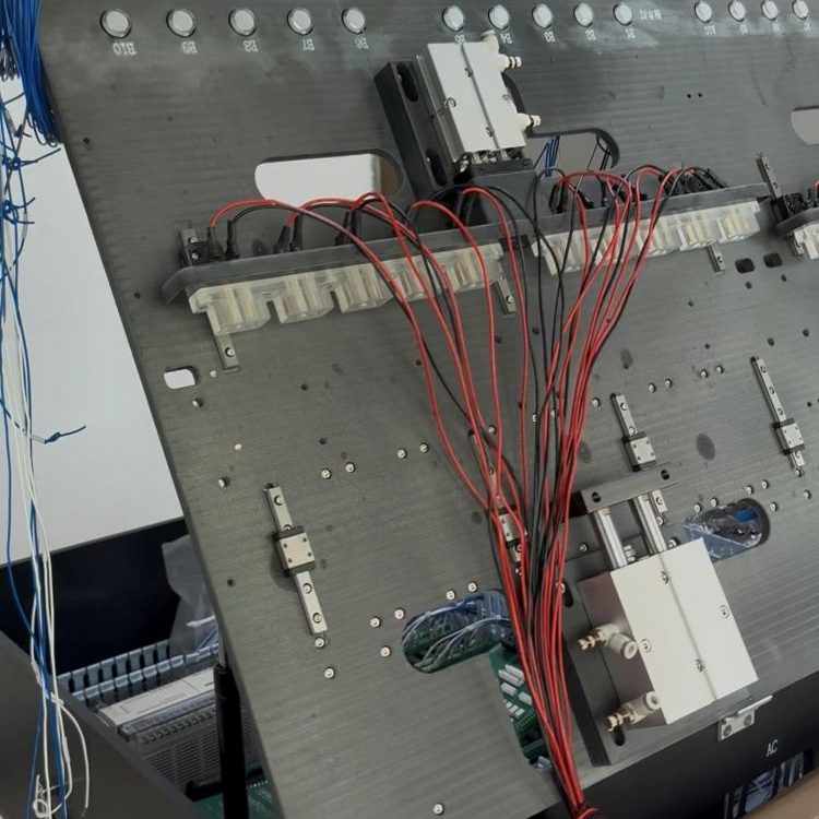 Long‑base multi‑channel parallel PCBA test rig, internal wiring and operator control panel view
